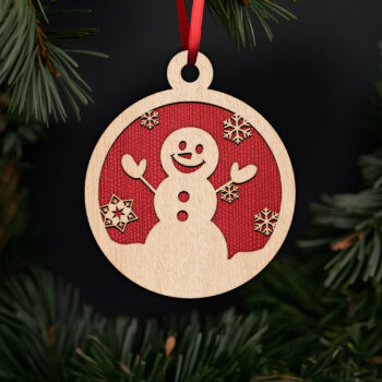 Festive snowman with snowflakes ornament with noble fir tree