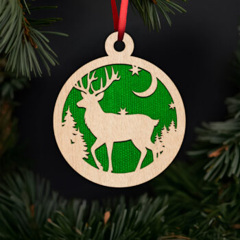 Majestic reindeer in forest ornament with noble fir tree