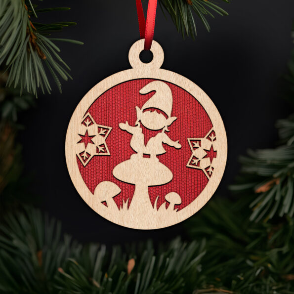 Playful gnome on mushroom ornament with noble fir tree