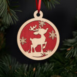 playful-reindeer-with-snowflakes-ornament-with-noble-fir-tree