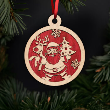 Santa and reindeer with christmas tree ornament with noble fir tree