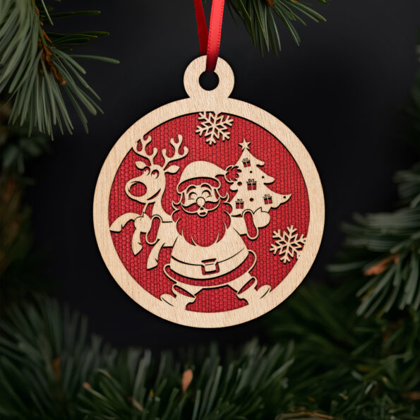 Santa and reindeer with christmas tree ornament with noble fir tree