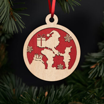 Santa giving gift to child ornament with noble fir tree