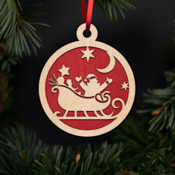 Santa in sleigh with moon ornament with noble fir tree