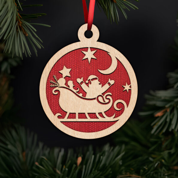 Santa in sleigh with moon ornament with noble fir tree