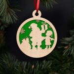 santa-sharing-gifts-with-child-ornament-with-noble-fir-tree